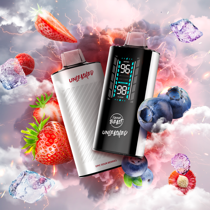 Two Flavour Beast Unleashed vapes in white and black, surrounded by strawberries, blueberries, and ice with a dynamic, stormy background.